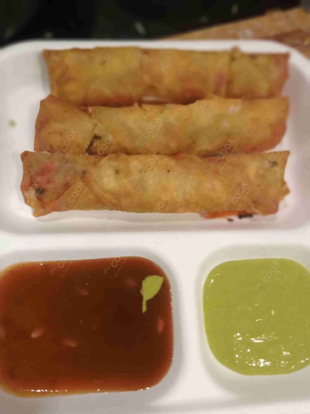 Delicious Veg Spring Rolls prepared by COOX