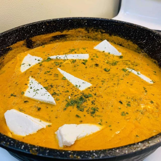 Delicious Paneer Butter Masala prepared by COOX