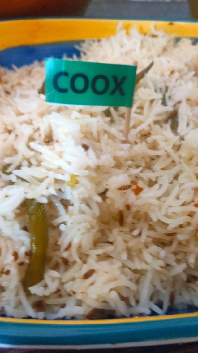 Delicious Jeera Rice prepared by COOX