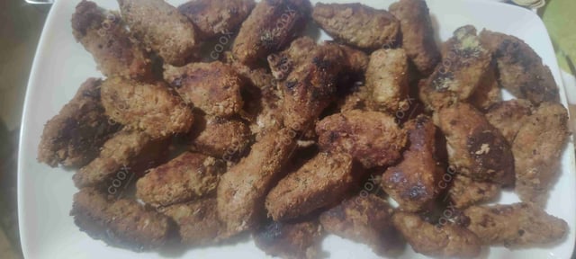 Delicious Mutton Seekh Kebab prepared by COOX