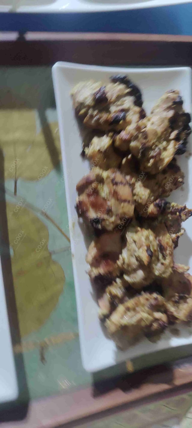 Delicious Murgh Malai Tikka prepared by COOX