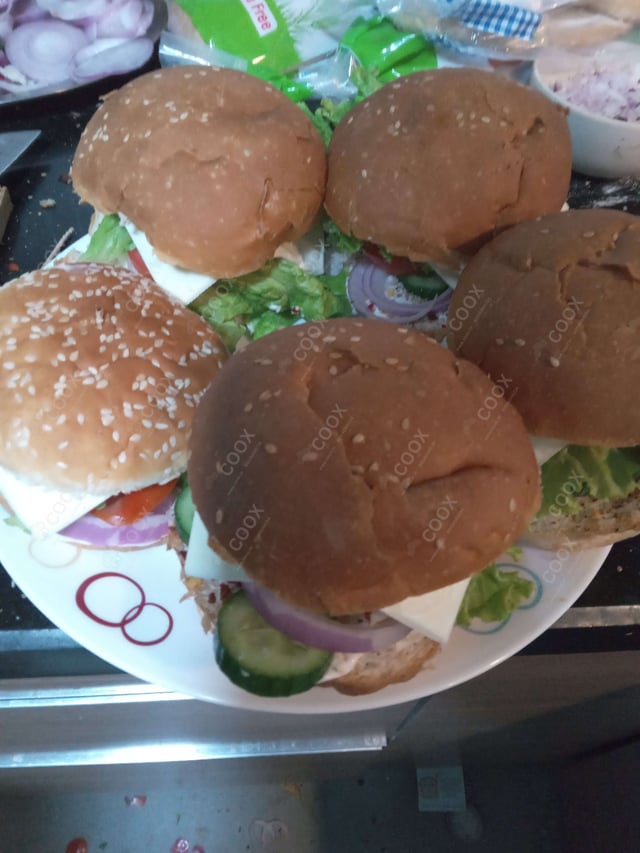 Delicious Mini Veg Burgers prepared by COOX