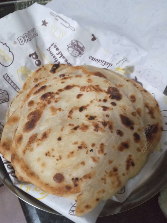 Delicious Lachha Parathas prepared by COOX