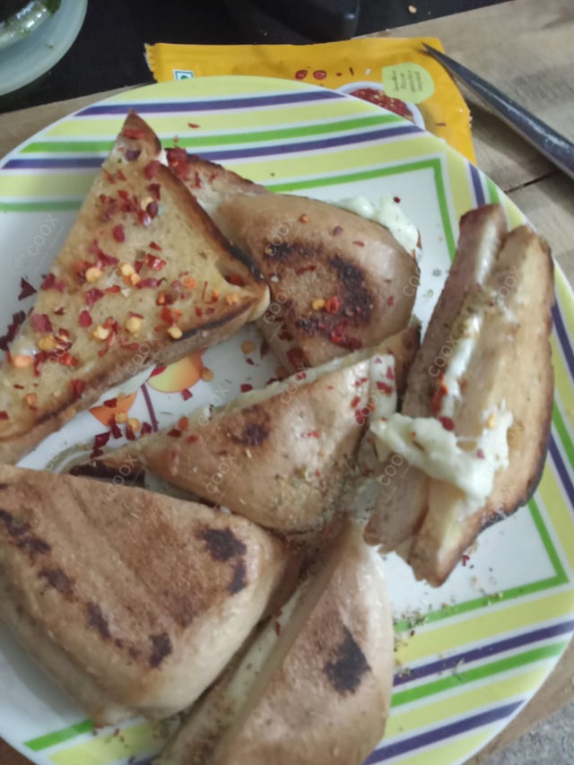 Delicious Garlic Bread with Cheese prepared by COOX