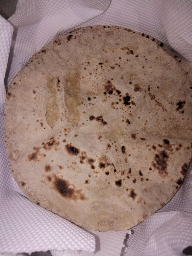 Delicious Tawa Rotis prepared by COOX