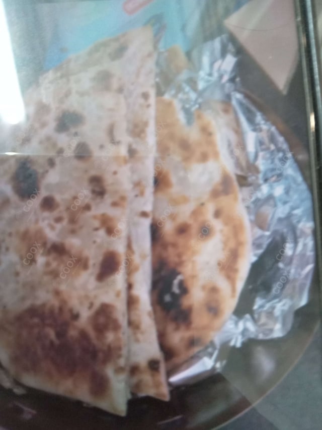 Delicious Naan (Butter / Garlic) prepared by COOX