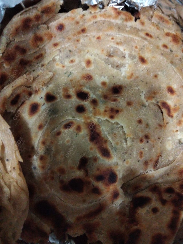 Delicious Lachha Parathas prepared by COOX