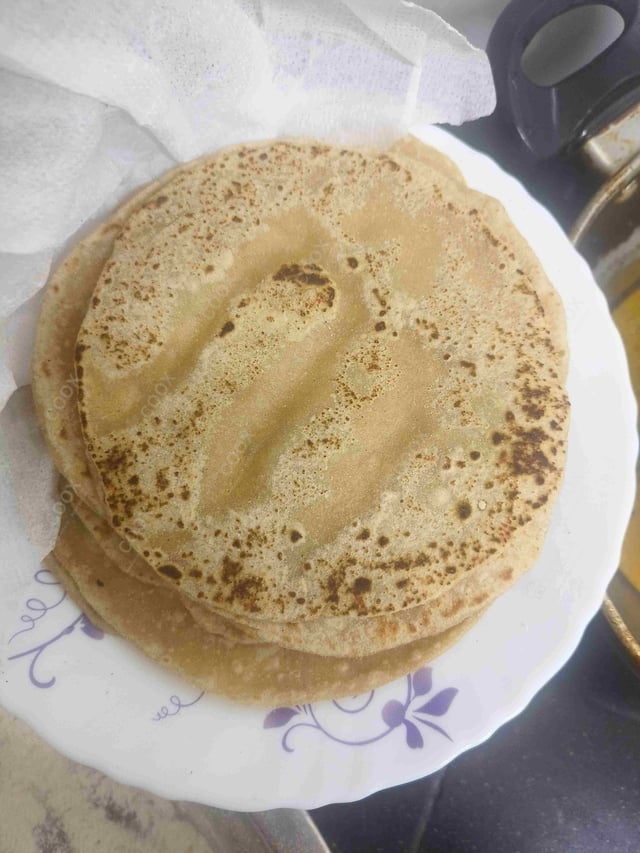 Delicious Tawa Rotis prepared by COOX