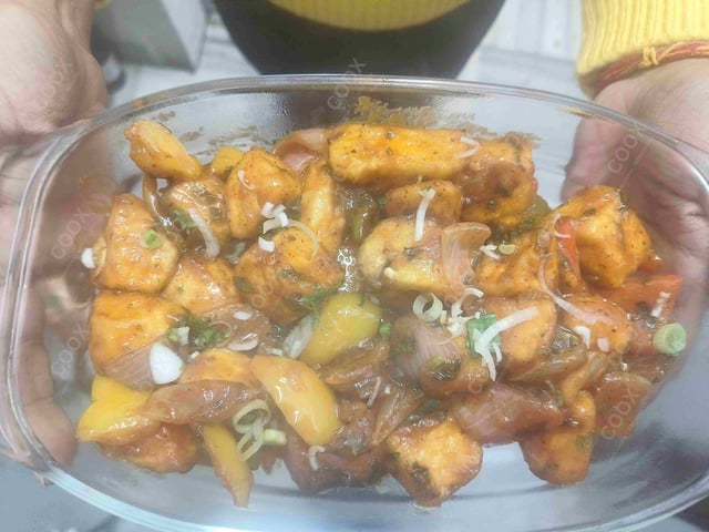 Delicious Chilli Paneer (Dry) prepared by COOX