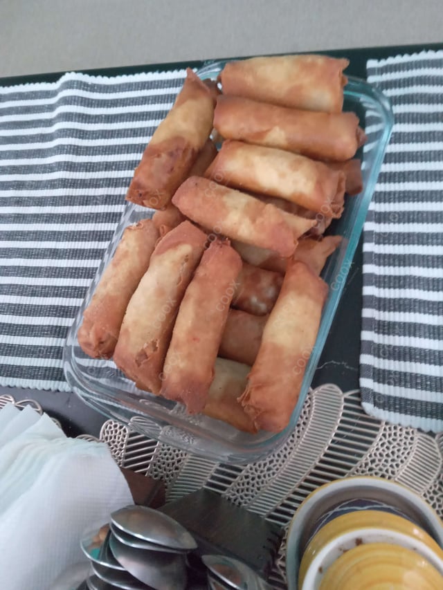 Delicious Chicken Spring Rolls prepared by COOX