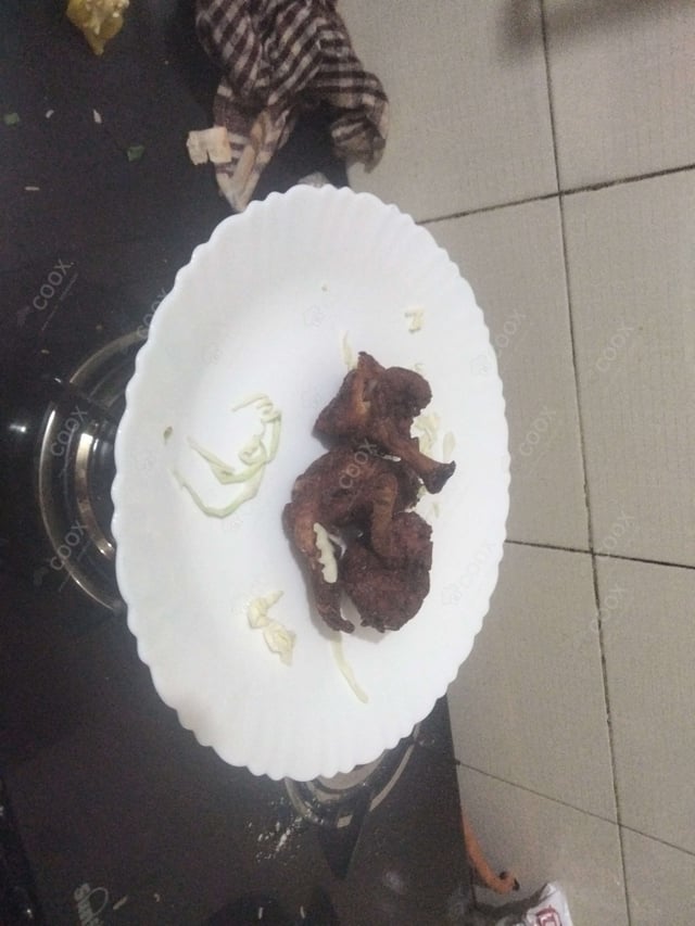 Delicious Chicken Lollipop prepared by COOX