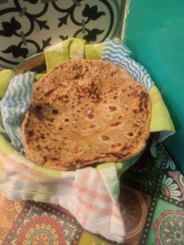 Delicious Stuffed Parathas prepared by COOX