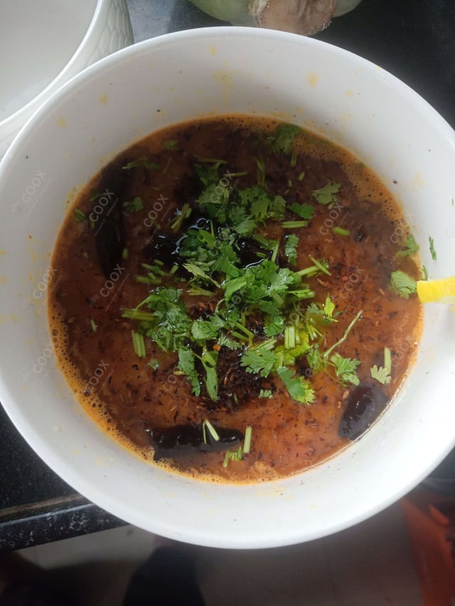 Delicious Dal Tadka prepared by COOX