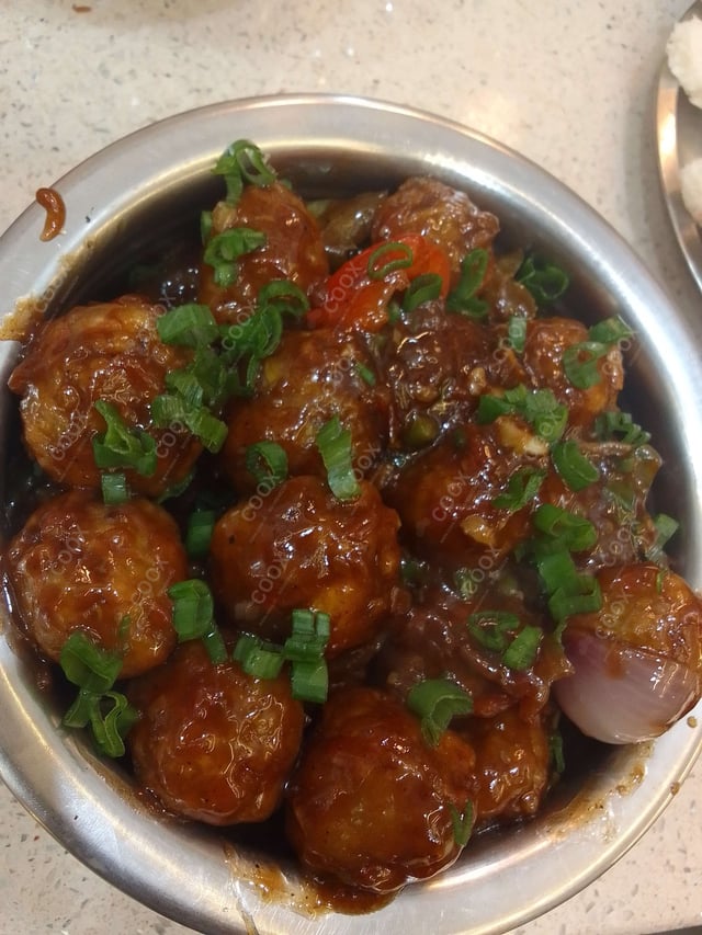 Delicious Veg Manchurian (Dry) prepared by COOX