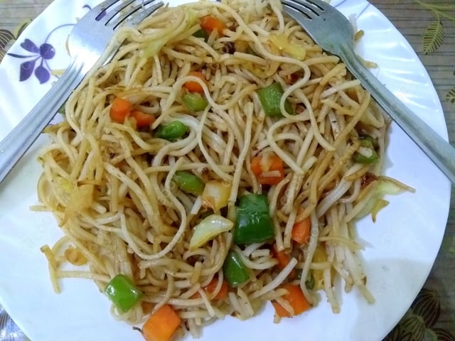 Delicious Veg Hakka Noodles prepared by COOX