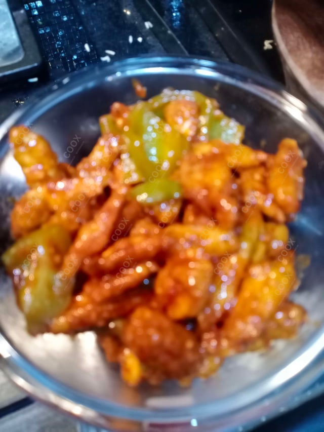 Delicious Crispy Chilly Baby Corn prepared by COOX