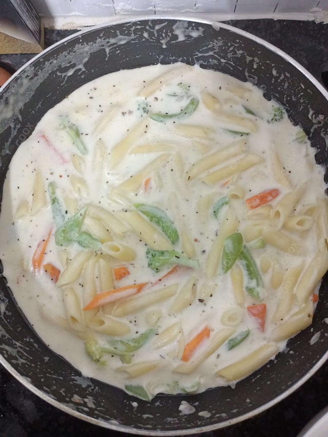 Delicious Pasta in White Sauce prepared by COOX