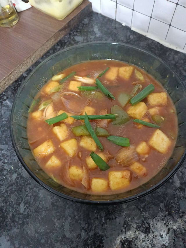 Delicious Chilly Paneer (Gravy) prepared by COOX