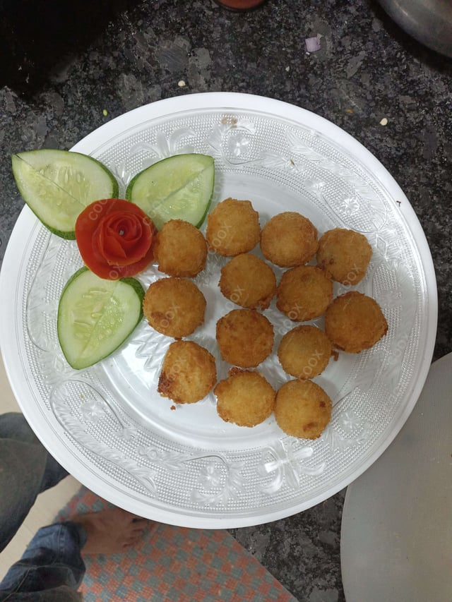 Delicious Fried Cheese Balls prepared by COOX