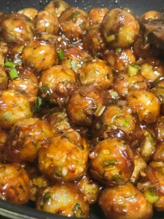 Delicious Veg Manchurian (Dry) prepared by COOX