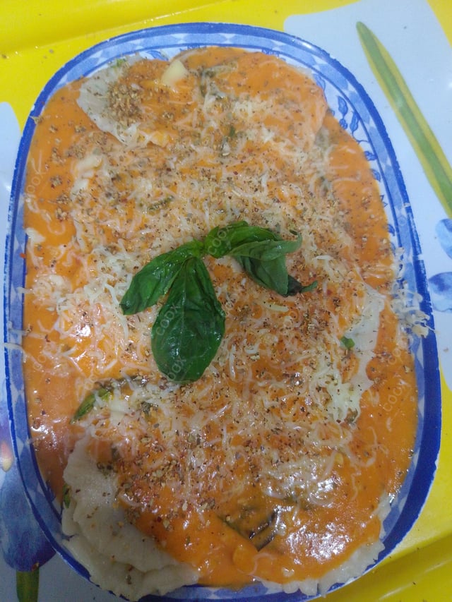 Delicious Ravioli in Pink Sauce prepared by COOX