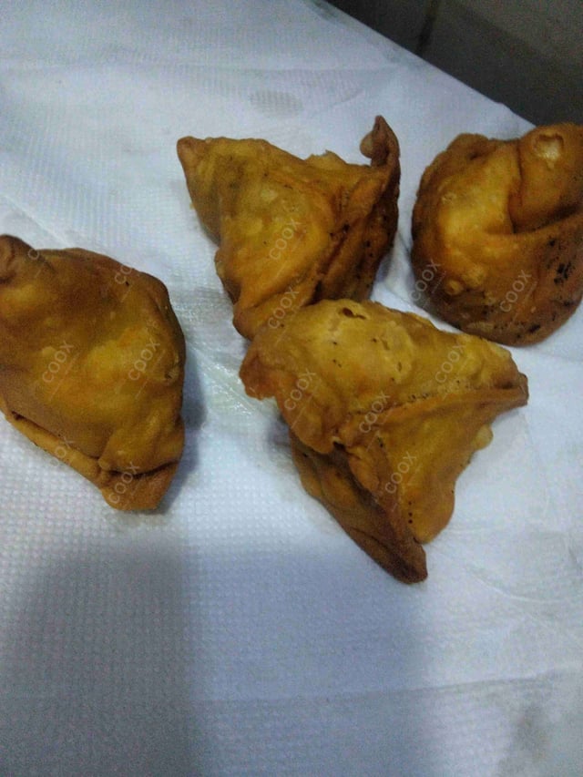 Delicious Mini Samosas prepared by COOX