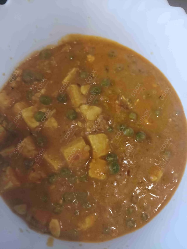 Delicious Matar Paneer prepared by COOX