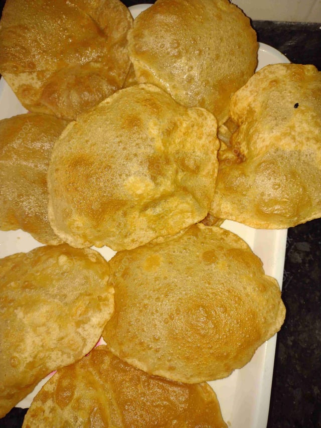 Delicious Pooris & Bedmis prepared by COOX