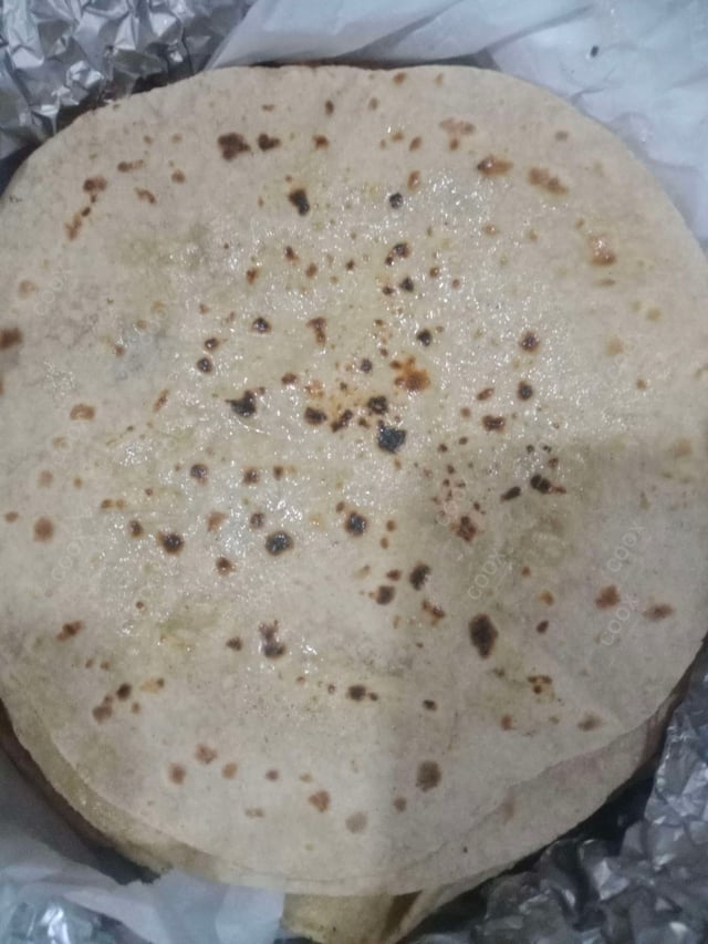 Delicious Tawa Rotis prepared by COOX