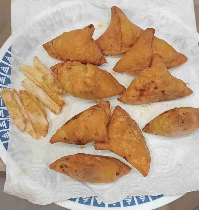 Delicious Mini Samosas prepared by COOX