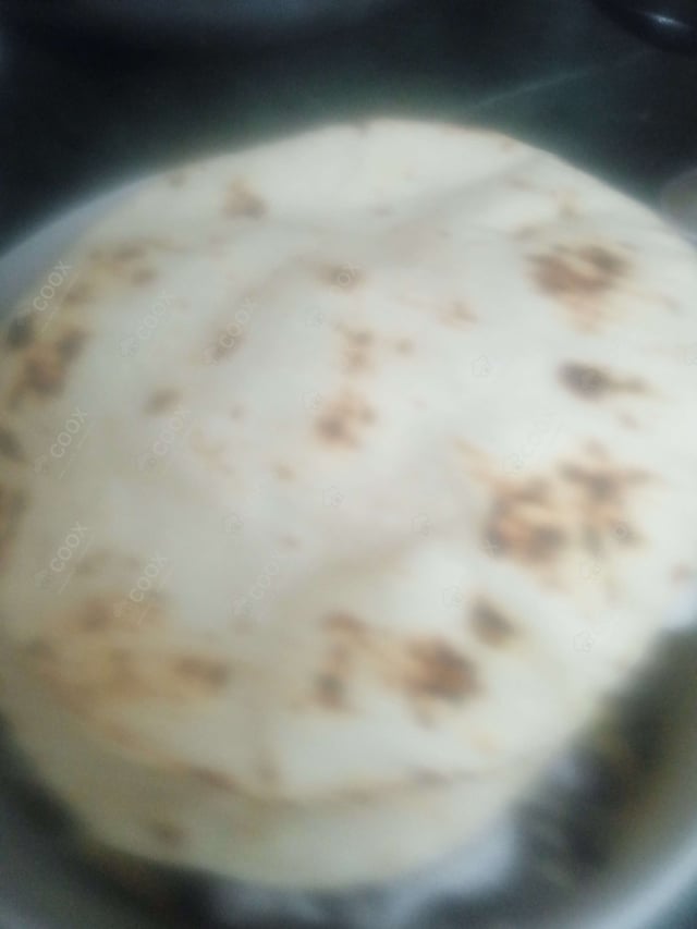 Delicious Tawa Rotis prepared by COOX