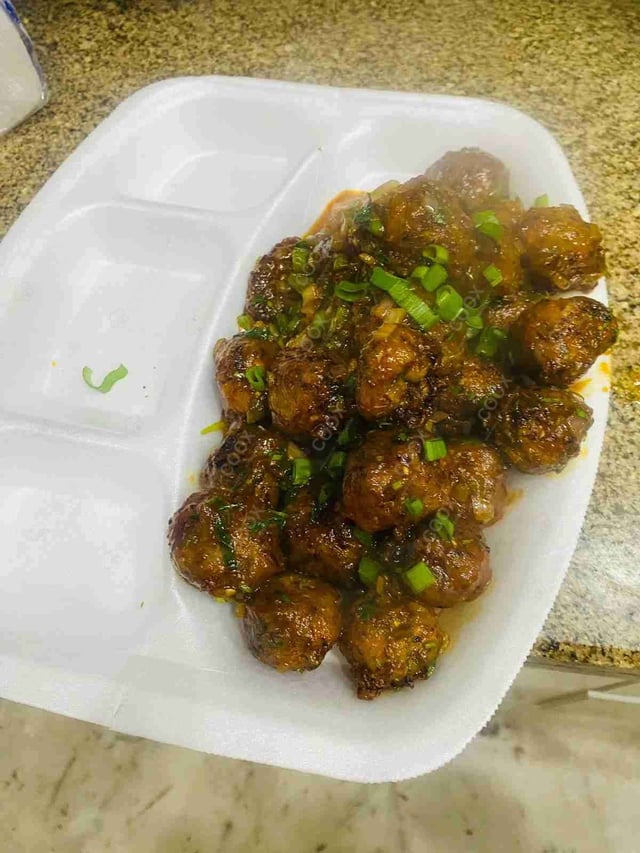 Delicious Veg Manchurian (Dry) prepared by COOX