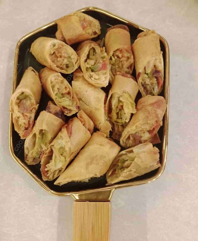 Delicious Veg Spring Rolls prepared by COOX