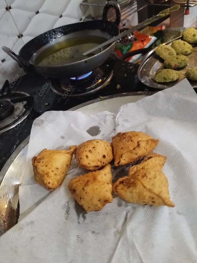 Delicious Mini Samosas prepared by COOX