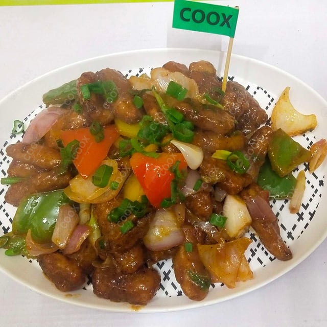 Delicious Crispy Chilly Baby Corn prepared by COOX