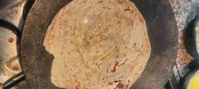 Delicious Lachha Parathas prepared by COOX