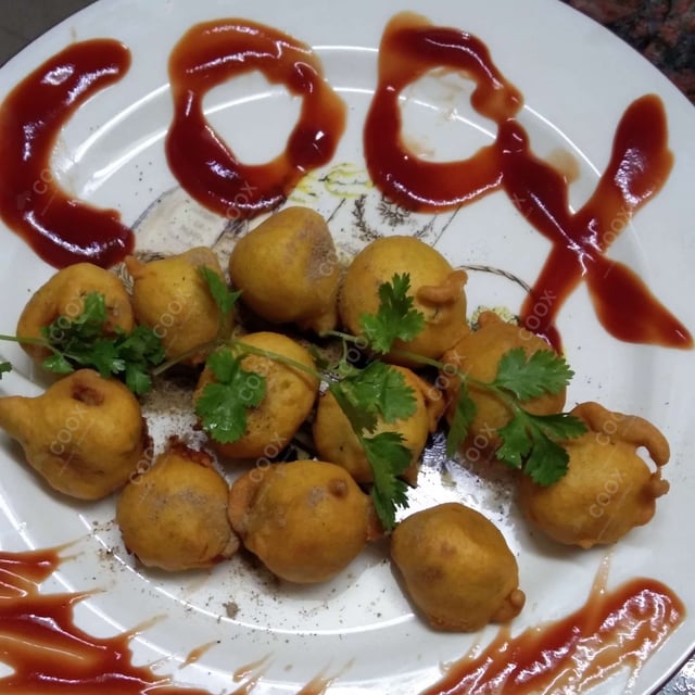 Delicious Aloo Bonda prepared by COOX