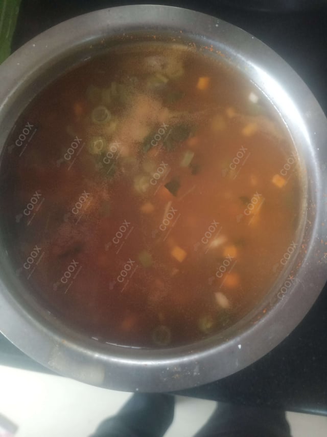 Delicious Vegetable Manchow Soup prepared by COOX