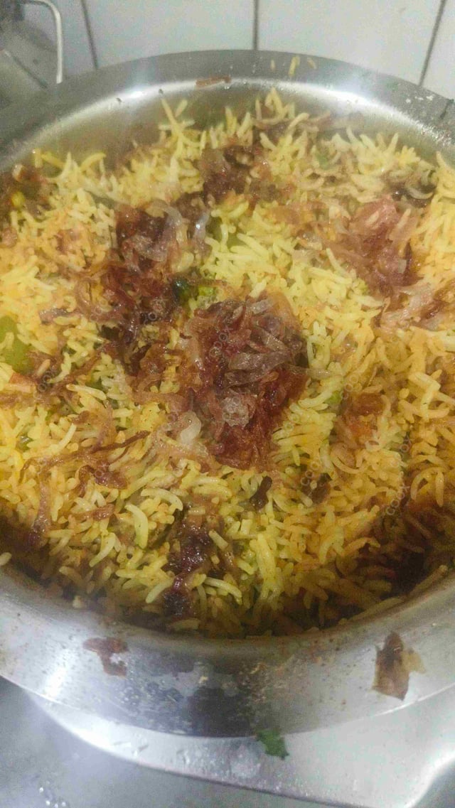 Delicious Veg Biryani prepared by COOX