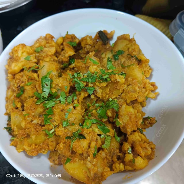 Delicious Jeera Aloo prepared by COOX