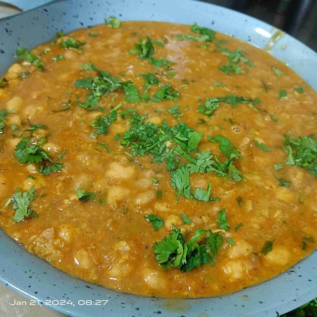 Delicious Chana Bhatura prepared by COOX