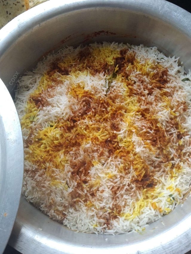 Delicious Veg Biryani prepared by COOX