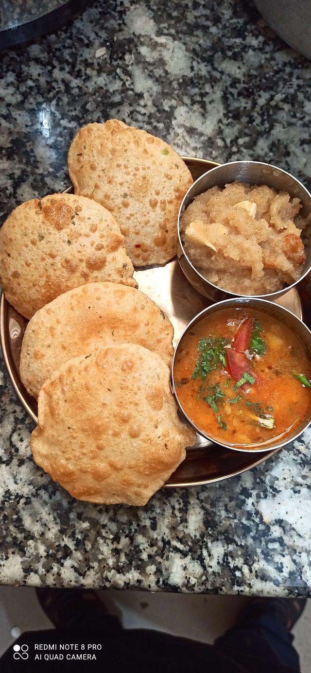 Delicious Poori Bhaji prepared by COOX