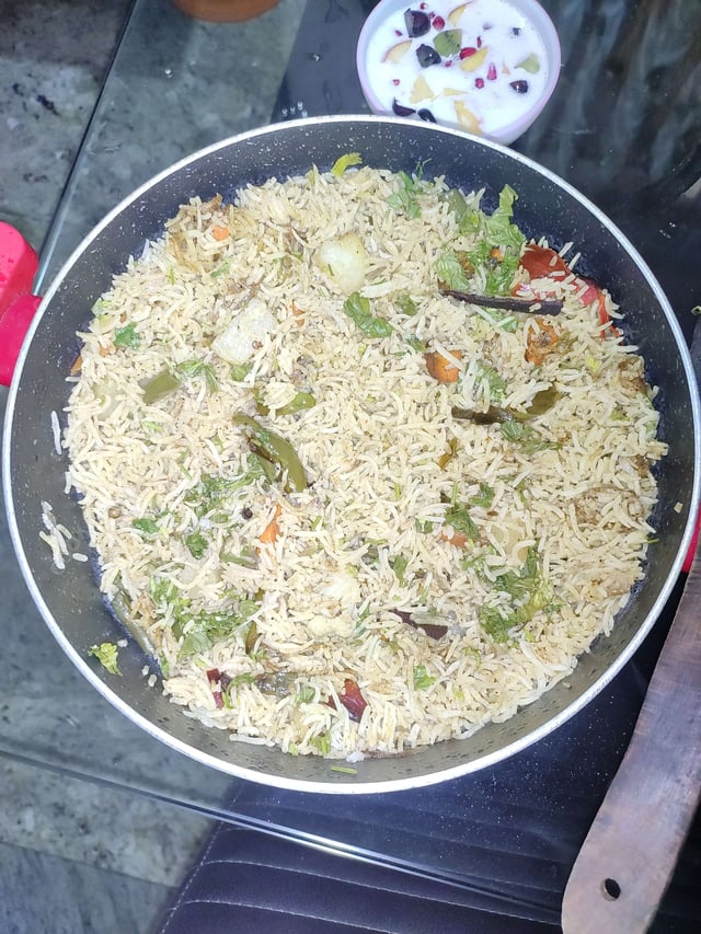 Delicious Veg Biryani prepared by COOX