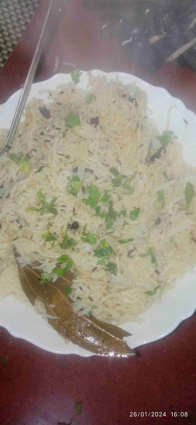 Delicious Jeera Rice prepared by COOX