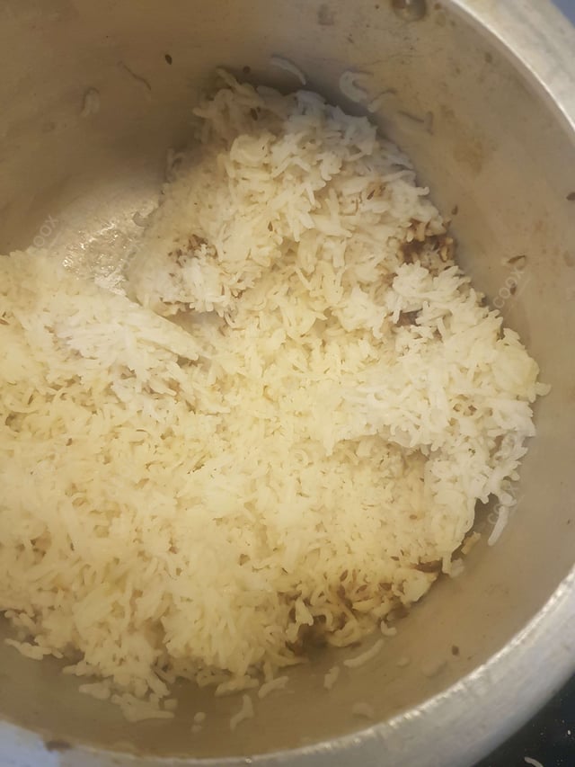 Delicious Jeera Rice prepared by COOX