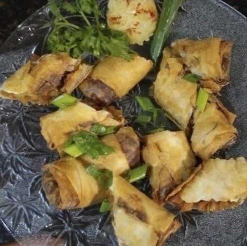 Delicious Veg Spring Rolls prepared by COOX