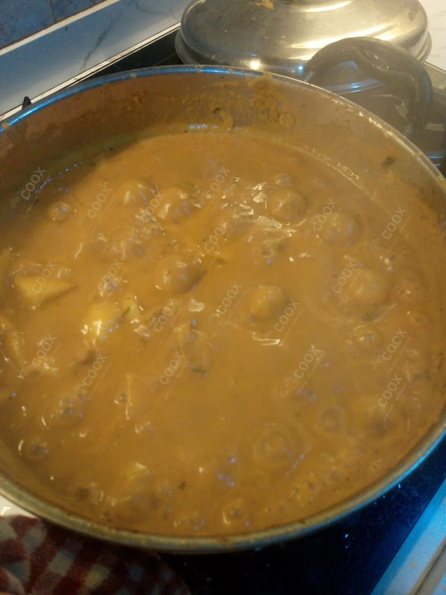 Delicious Aloo Gravy prepared by COOX