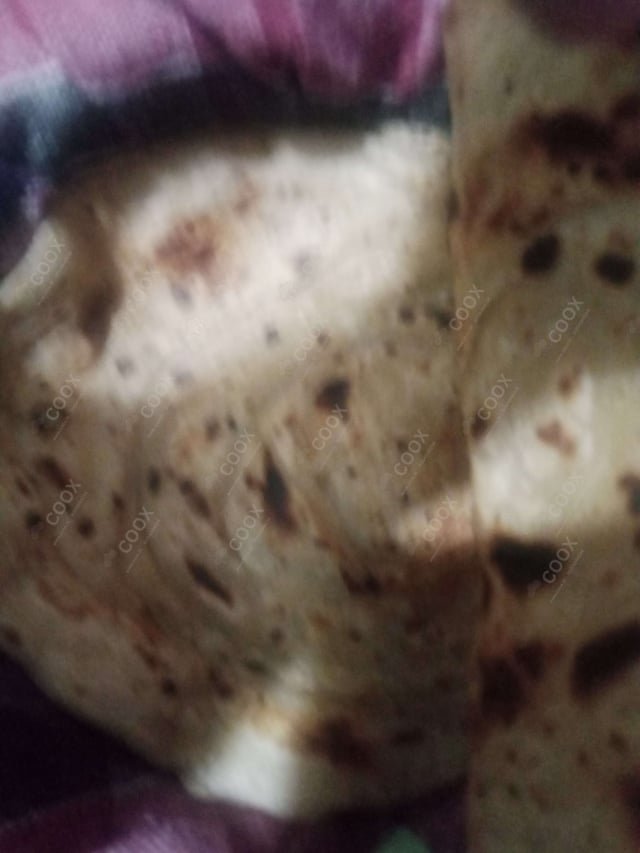 Delicious Naan (Butter / Garlic) prepared by COOX