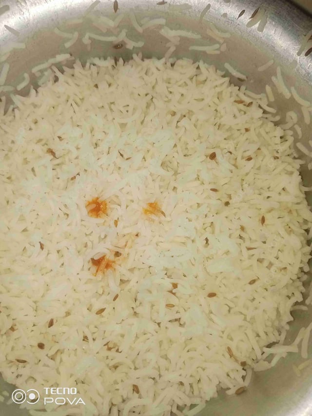 Delicious Jeera Rice prepared by COOX